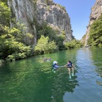 The pleasures of refresing water during Cetina river rafting near Split Swimming in pure nature of Cetina river