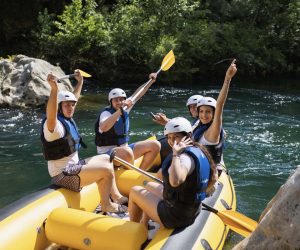 All smiles and fun on rafting tour in Omiš with Rio rafting team Group on Cetina rafting tour