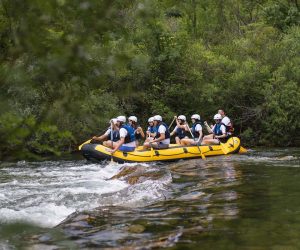Battling Cetina river in boat